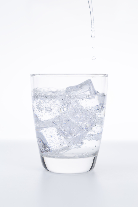 Soda water poured into a glass