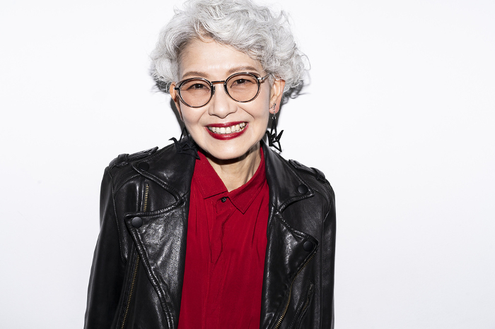 Portrait of a stylish and energetic Japanese senior woman.