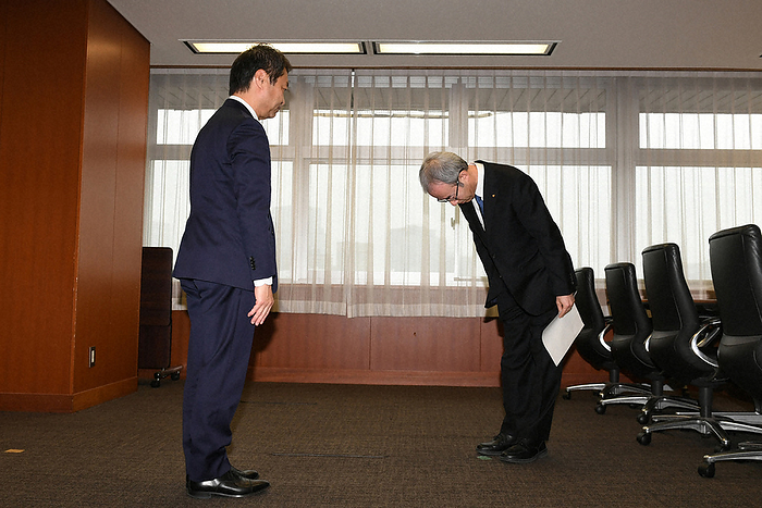 Koichi Ito, president of the company, receives a corrective action order from Hirohisa Tsuruta, director general of the Logistics and Motor Vehicles Bureau of the Ministry of Land, Infrastructure, Transport and Tourism. Koichi Ito, president of Toyota Industries Corporation, receives a corrective action order from Hirohisa Tsuruta, director general of the Logistics and Motor Vehicles Bureau of the Ministry of Land, Infrastructure, Transport and Tourism  left , in response to the engine certification fraud issue by Toyota Industries Corporation.