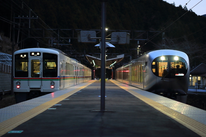 Seibu-Chichibu line at dusk exchanging trains at a station