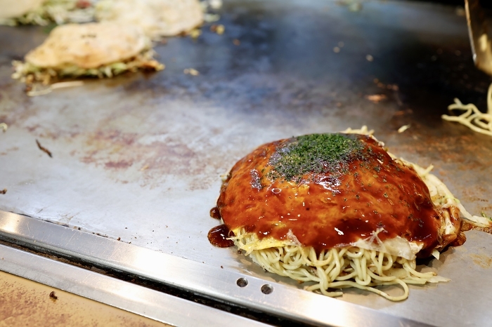 Hiroshima-style okonomiyaki on teppan