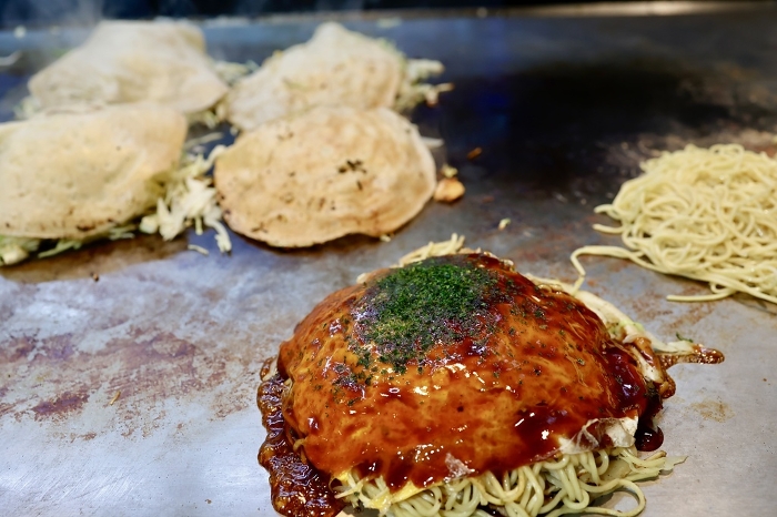 Hiroshima-style okonomiyaki on teppan