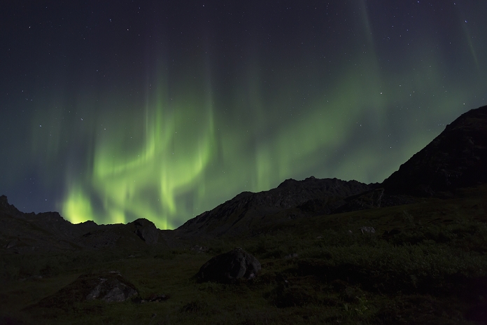 Aurora Borealis (Northern Lights) dancing in the Talkeetna Mountains in Archangel Valley, Hatcher Pass, South central Alaska; Alaska, United States of America