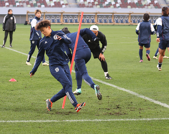 Women s Soccer: Asian Final Qualifying Round for the Paris Olympics   Japan s Preparation for the 2nd Round  Japan Women s National Soccer Team Practice Fujino  left front  and the rest of the team practice on a rough pitch  Photo by Kentaro Nishiumi  Photo date: 20240227