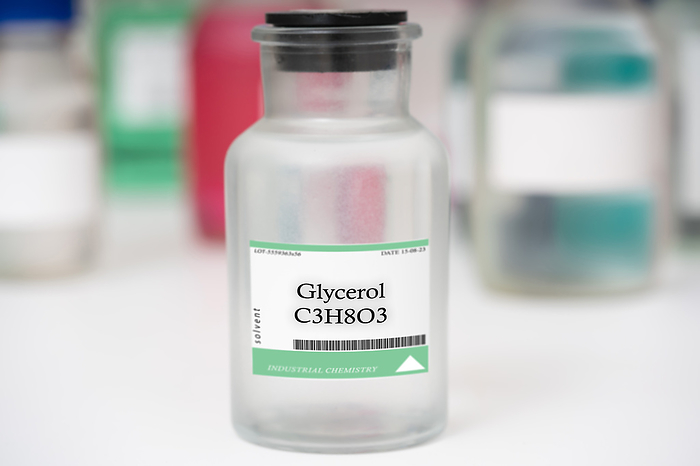 Bottle of glycerol Bottle of glycerol. A colourless, viscous liquid used as a solvent and in the production of various chemicals, such as cosmetics and food products., by WLADIMIR BULGAR SCIENCE PHOTO LIBRARY