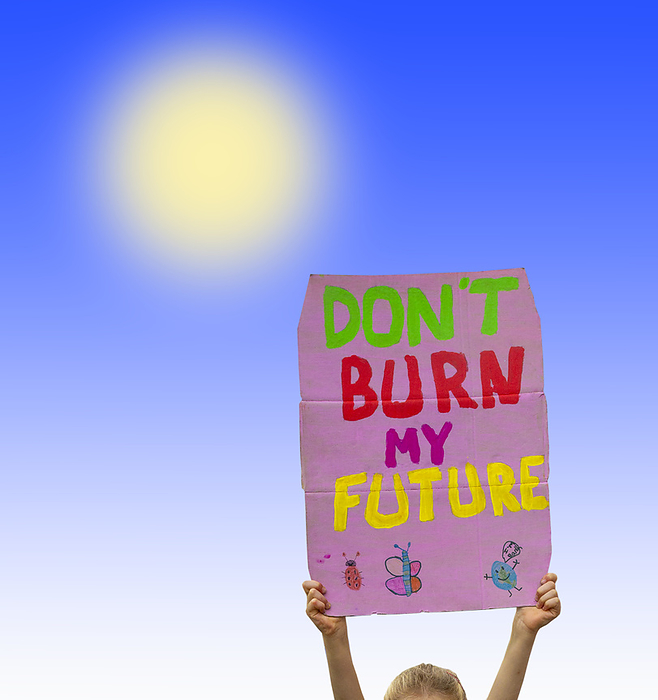 Environmental protest, composite image Composite image of an environmental protest, showing a child holding a placard with  DON T BURN MY FUTURE  written on it. This represents people protesting on environmental issues such as global warming and climate change., by VICTOR de SCHWANBERG SCIENCE PHOTO LIBRARY