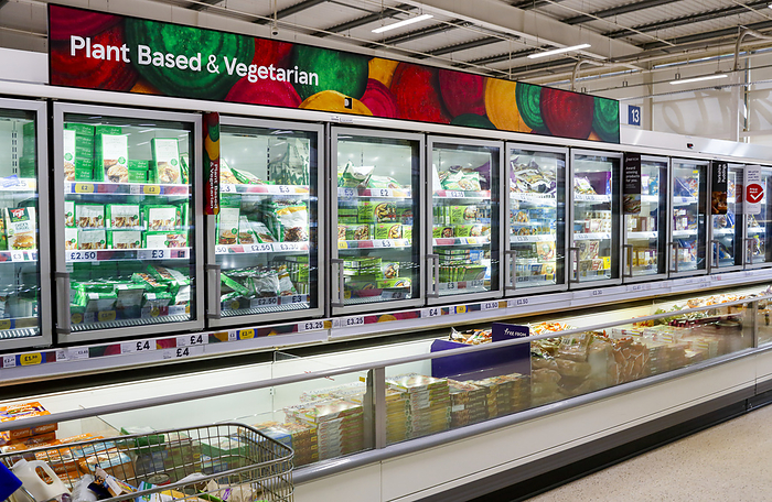 Vegetarian aisle in supermarket Vegetarian aisle in supermarket., by VICTOR de SCHWANBERG SCIENCE PHOTO LIBRARY