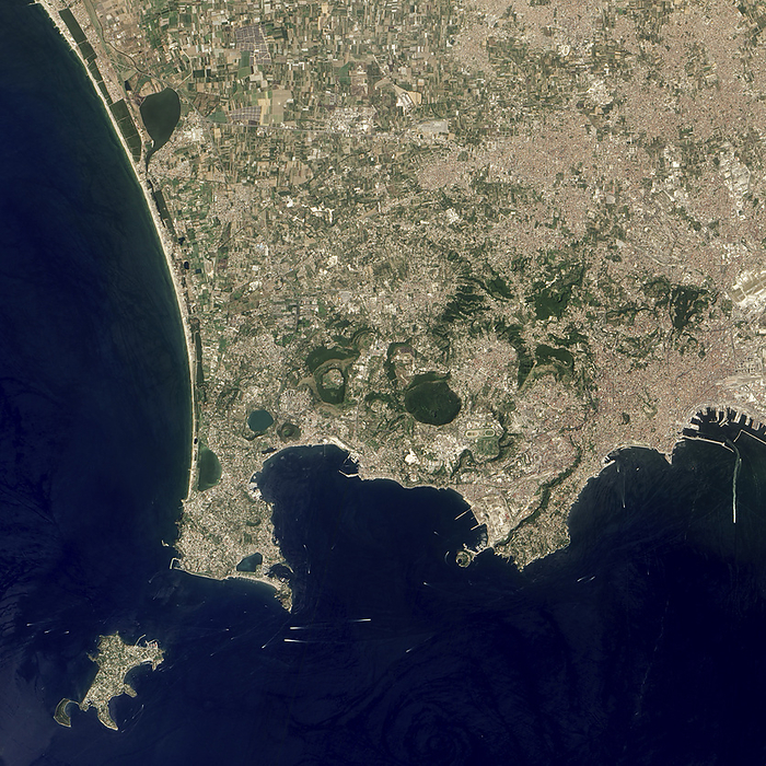 Campi Flegrei, Italy, satellite image Campi Flegrei, Italy, satellite image. The city of Naples is at right centre. This coastal volcanic region consists of a caldera, which is mostly underwater in the Gulf of Pozzuoli at lower centre, and numerous associated volcanic craters, domes and cinder cones. Image obtained by the Advanced Land Imager  ALI  on the Earth Observing 1  EO 1  satellite on 9th July 2012., by NASA Earth Observatory SCIENCE PHOTO LIBRARY