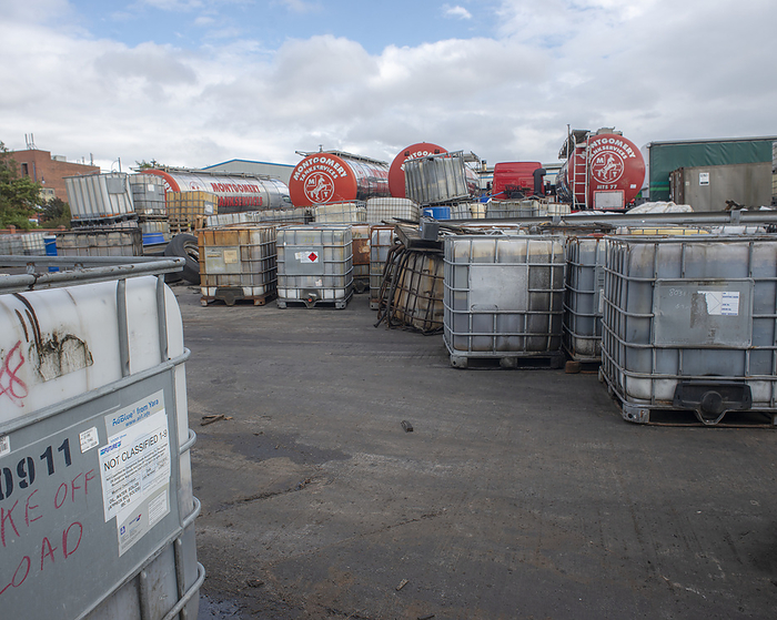 Hazardous waste disposal facility Drums of chemical waste at a treatment and disposal facility, Bootle, Liverpool, UK., by ROBERT BROOK SCIENCE PHOTO LIBRARY