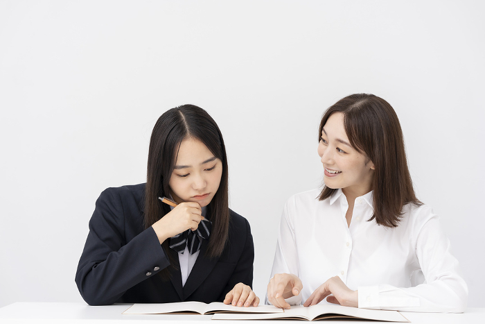 Japanese female teacher and student/white back (People)