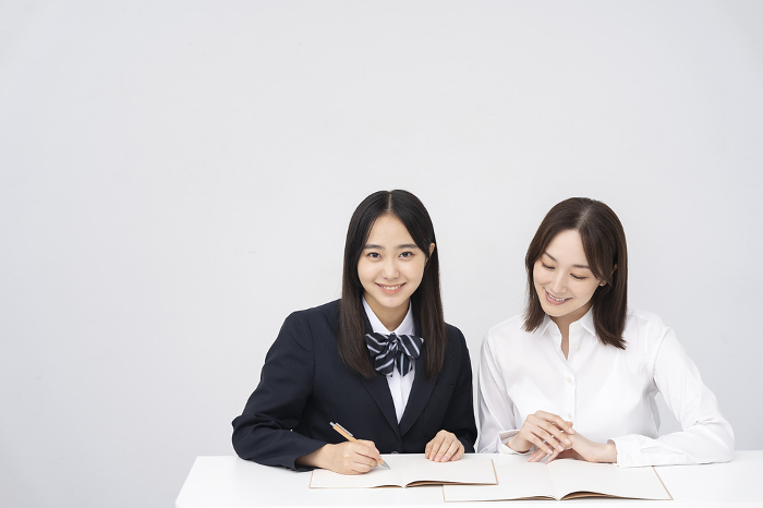 Japanese female teacher and student/white back (People)
