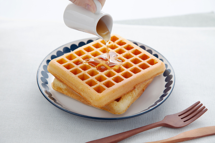 Waffles with maple syrup Table