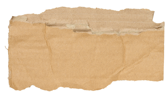 Piece of brown cardboard with torn edges on isolated background, close up Piece of brown cardboard with torn edges on isolated background, close up