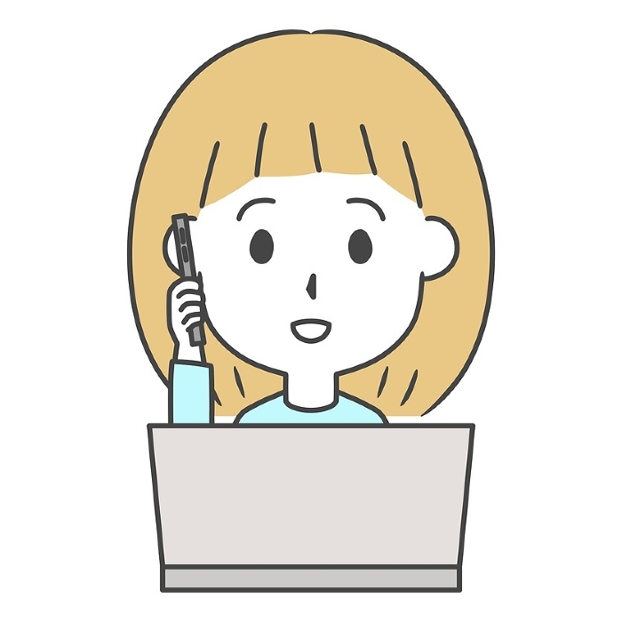Clip art of woman making a phone call in front of laptop computer