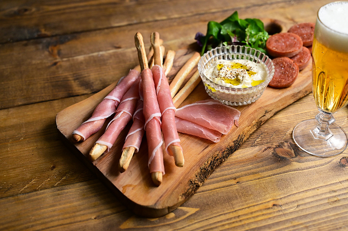 Prosciutto and Grissini, dips and other snacks