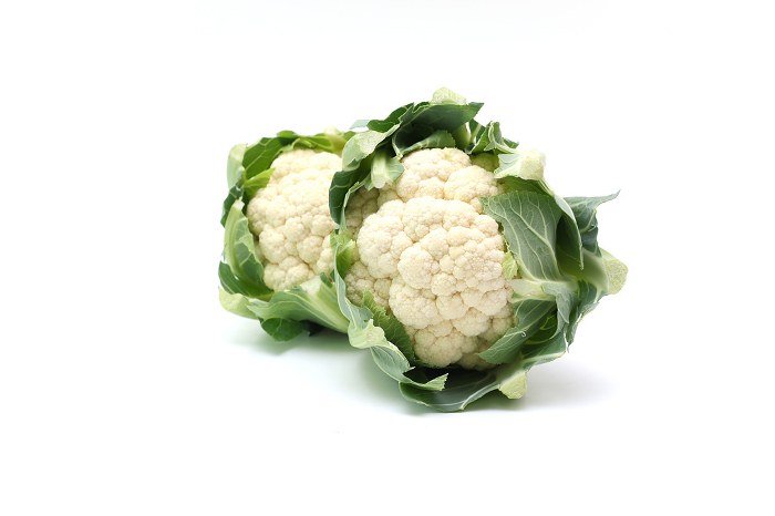 Two cauliflowers on white background