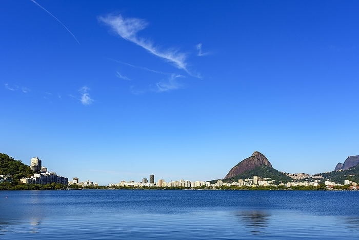 View of the beautiful Rodrigo de Freitas lagoon in Rio de Janeiro. One of the main tourist attractions surrounded by the mountains and buildings of the city, Brasil, by Fred Pinheiro