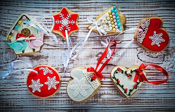 Assortment of Christmas gingerbread on an old wooden board, by Dzmitri Mikhaltsow