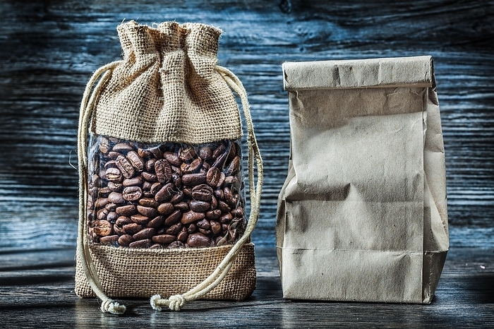 Coffee beans in sacks and paper bags, by Dzmitri Mikhaltsow