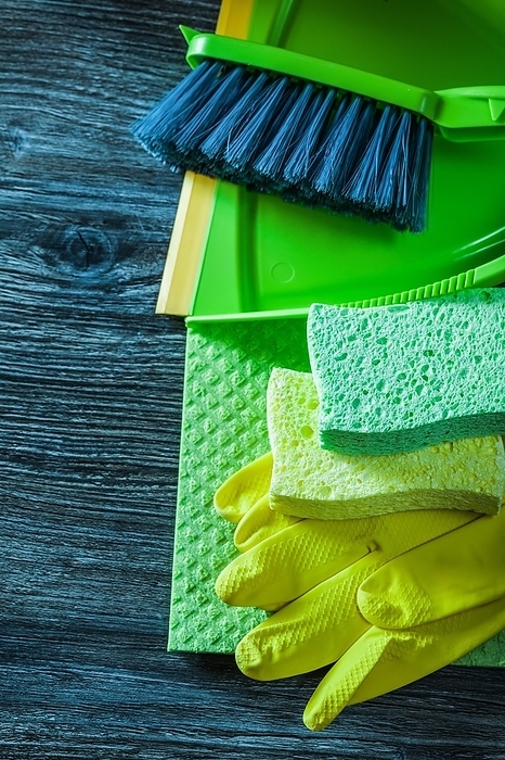 Dustpan Brush Sponges Protective gloves Washcloths on wooden board, by Dzmitri Mikhaltsow