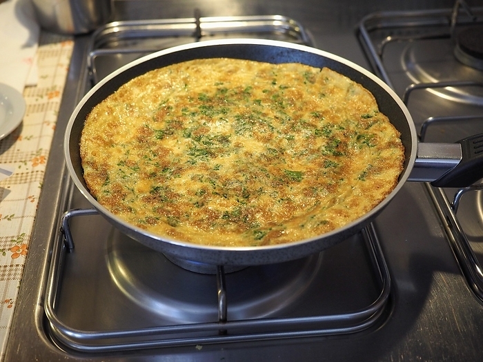 Omelette made from fried beaten eggs, by Claudio Divizia