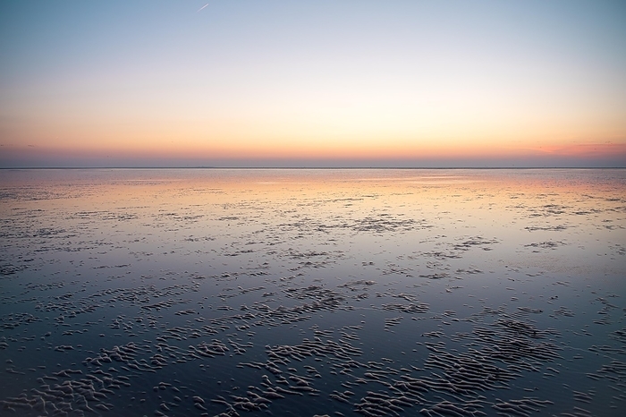 Sunrise in the Wadden Sea, Rippelwatt at low tide, Lower Saxony Wadden Sea National Park, Schillig, Germany, Europe, by Farina Graßmann