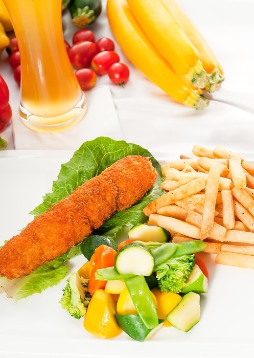 Fresh breaded chicken breast roll and vegetables, with lager beer and fresh vegetables on background, food photography, by keko64