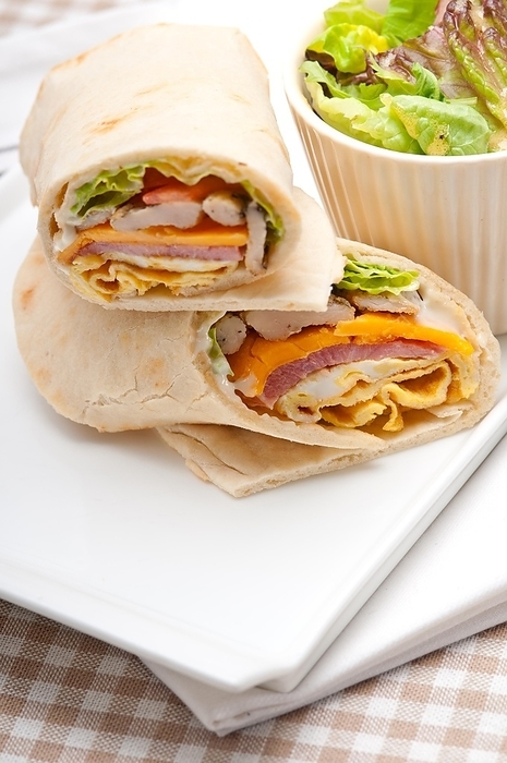 Fresh and healthy club sandwich pita bread roll, by keko64