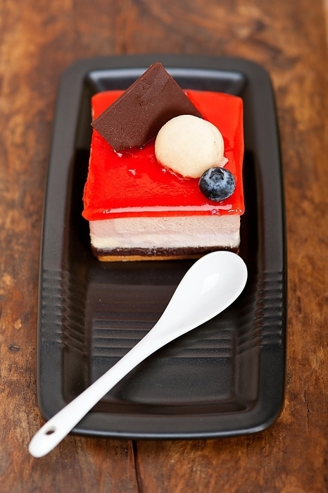 Fresh strawberry yogurt mousse with macaroon and blueberry on top, by Fracesco Perre