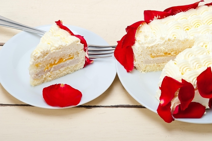 Whipped cream mango cake with red rose petals, food photography, by Francesco Perre