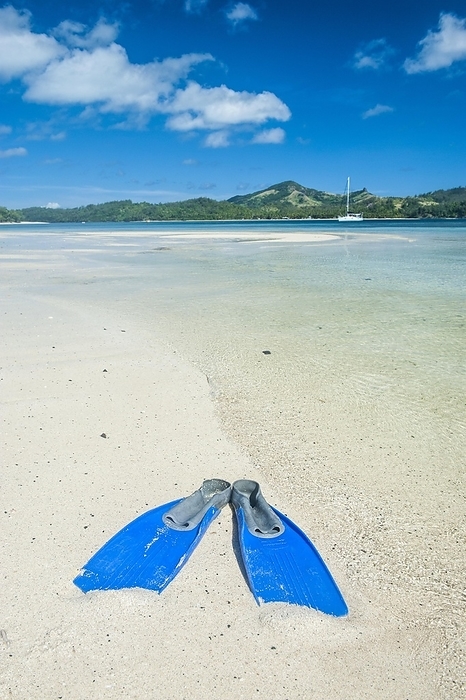 Flippers in the water of the blue lagoon, Yasawas, Fiji, South Pacific, Oceania, by Michael Runkel