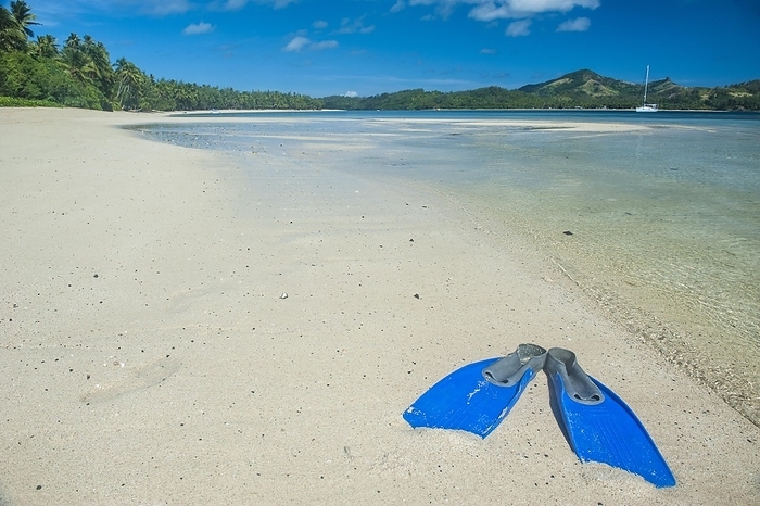 Flippers in the water of the blue lagoon, Yasawas, Fiji, South Pacific, Oceania, by Michael Runkel