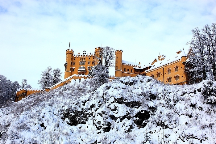 Hohenschwangau Castle in winter, snow, cold, in the district of Hohenschwangau in the municipality of Schwangau near Füssen in Bavaria, Germany, Europe, by Sunny Celeste