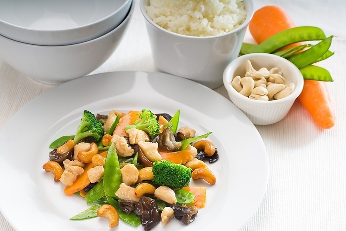 Fresh chicken and vegetables stir fried with cashew nuts, typical chinese dish, by keko64