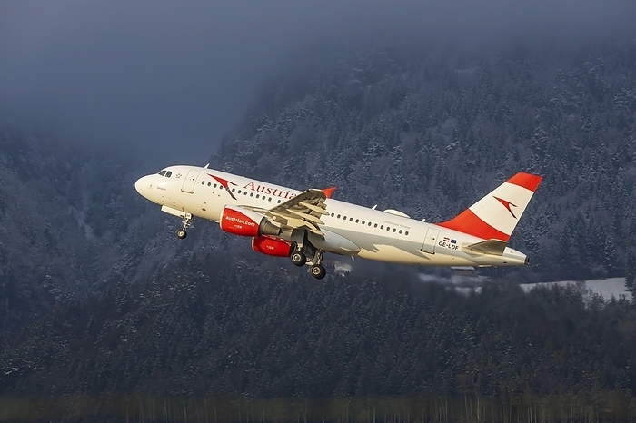 Aircraft on take-off, Austrian Airlines, AUA, Airbus A319-100, snow lies on the mountains, Kranebitten Airport, Innsbruck, Tyrol, Austria, Europe, by Arnulf Hettrich
