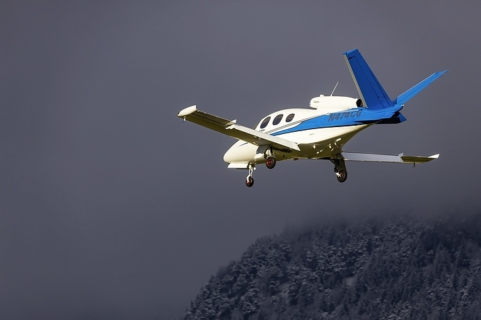 Aircraft Cirrus SF-50 Vision, private jet, snow lies on the mountains, Kranebitten Airport, Innsbruck, Tyrol, Austria, Europe, by Arnulf Hettrich