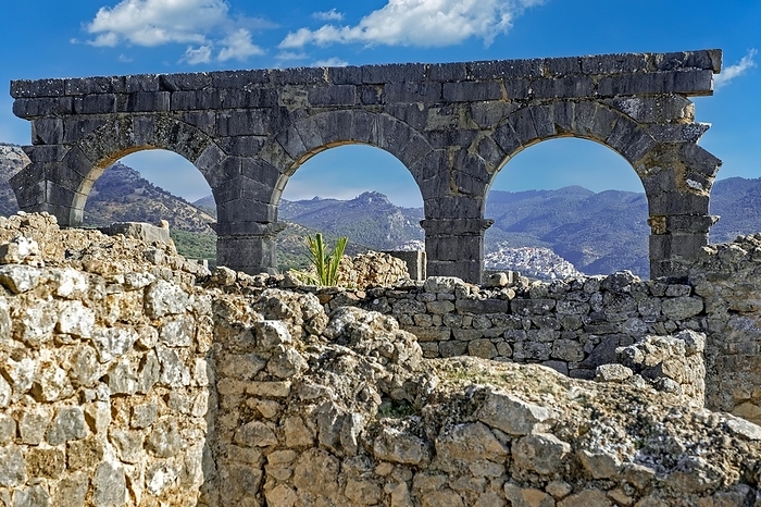 Rif Mountains seen through arches of the North Baths ruins at Volubilis, Berber-Roman city from ancient Mauretania near Meknes, Fez-Meknes, Morocco, Africa, by alimdi / Arterra / Marica van der Meer