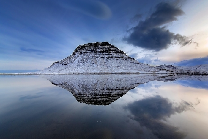 Iceland Kirkjufell, nunatak hill covered in snow reflected in water of fjord on the Sn fellsnes peninsula in winter, most photographed mountain in Iceland, by alimdi   Arterra   Sven Erik Arndt