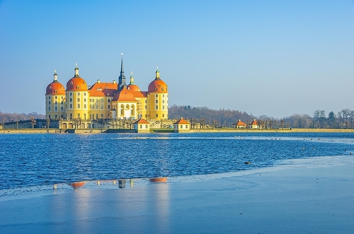Winterly Moritzburg Castle from the northwest, surrounded by the partly frozen castle pond, Moritzburg near Dresden, Saxony, Germany, Europe, by Ullrich Gnoth