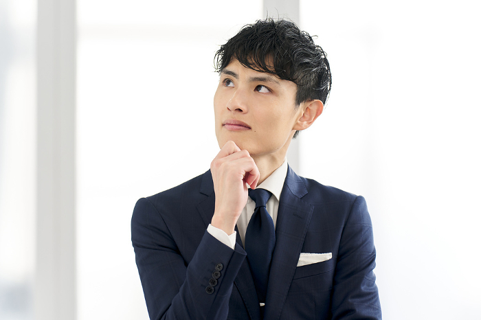 A Japanese businessman in a custom-made suit (People)