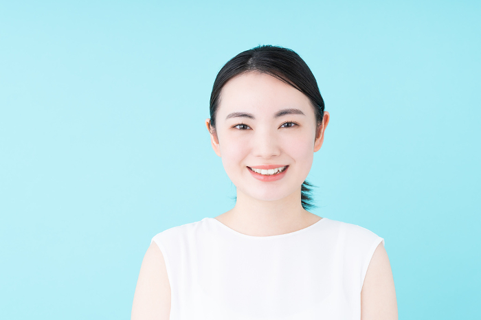 Young Japanese woman in skin care (People)