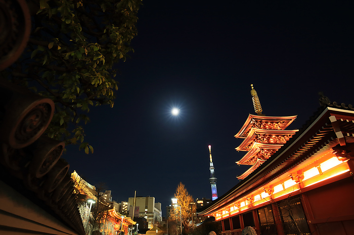 The five-story pagoda of Sensoji Temple and Tokyo Sky Tree illuminated by the full moon, Tokyo