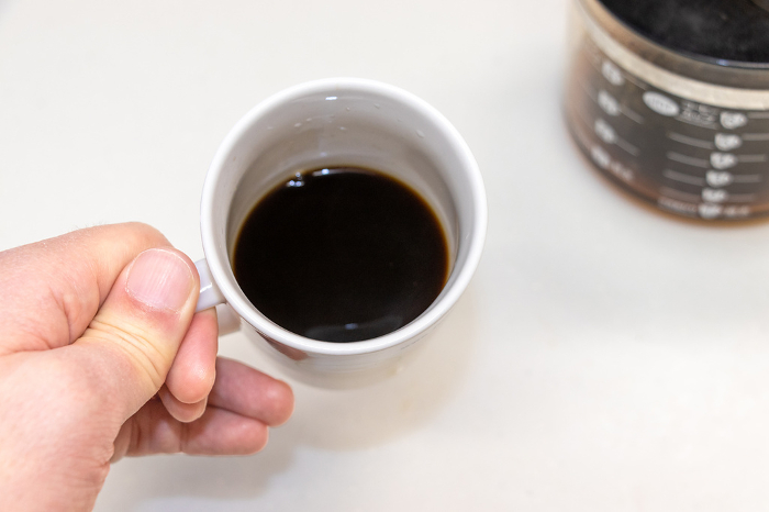 Coffee poured into a mug