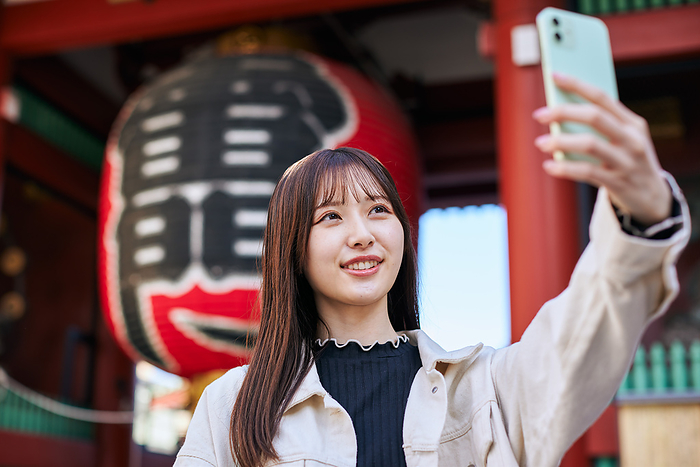 Japanese woman taking a selfie