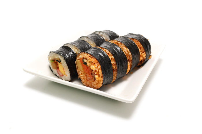 Kimbap on a plate with white background