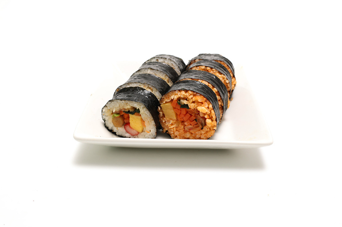 Kimbap on a plate with white background