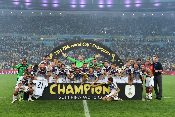 2014 FIFA World Cup Final Germany Wins 4th title in 6 tournaments Germany team group  GER , JULY 13, 2014   Football   Soccer : Germany players and coaching staff celebrate with the trophy after winning the FIFA World Cup Brazil 2014 Final match between Germany 1 0 Argentina at Estadio do Maracana in Rio De Janeiro, Brazil.  Photo by Photoraid AFLO 