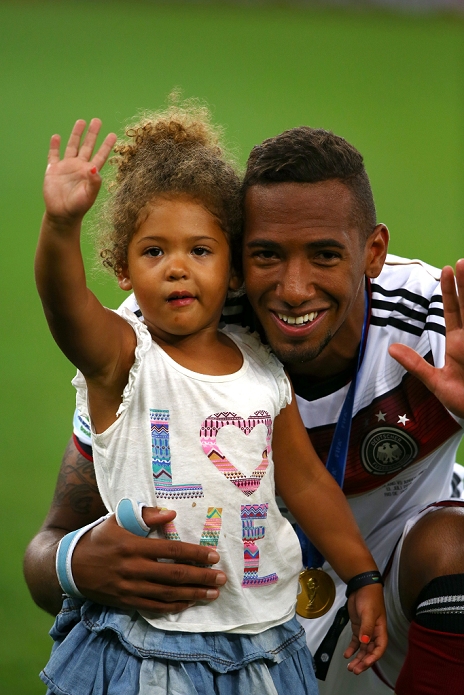 2014 FIFA World Cup Final Germany Wins 4th title in 6 tournaments Jerome Boateng  GER , JULY 13, 2014   Football   Soccer : Jerome Boateng of Germany celebrates with his daughter after winning the FIFA World Cup Brazil 2014 Final match between Germany 1 0 Argentina at Estadio do Maracana in Rio De Janeiro, Brazil.  Photo by Photoraid AFLO 