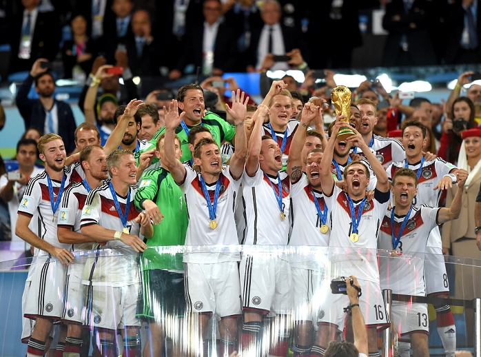 2014 FIFA World Cup Final Germany Wins 4th title in 6 tournaments Germany team group  GER , JULY 13, 2014   Football   Soccer : Philipp Lahm of Germany holds up the trophy as he celebrates with his teammates after winning the FIFA World Cup Brazil 2014 Final match between Germany 1 0 Argentina at Estadio do Maracana in Rio De Janeiro, Brazil.  Photo by FAR EAST PRESS AFLO 