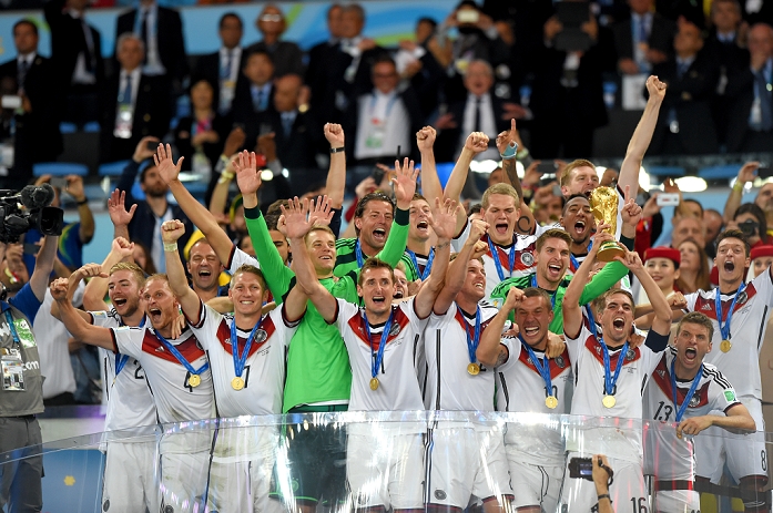 2014 FIFA World Cup Final Germany Wins 4th title in 6 tournaments Germany team group  GER , JULY 13, 2014   Football   Soccer : Philipp Lahm of Germany holds up the trophy as he celebrates with his teammates after winning the FIFA World Cup Brazil 2014 Final match between Germany 1 0 Argentina at Estadio do Maracana in Rio De Janeiro, Brazil.  Photo by FAR EAST PRESS AFLO 